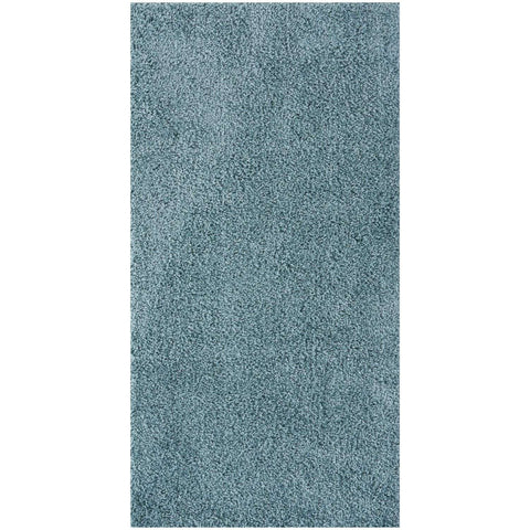 A plush textured teal duck egg blue rug with a soft shaggy surface perfect for cozy spaces