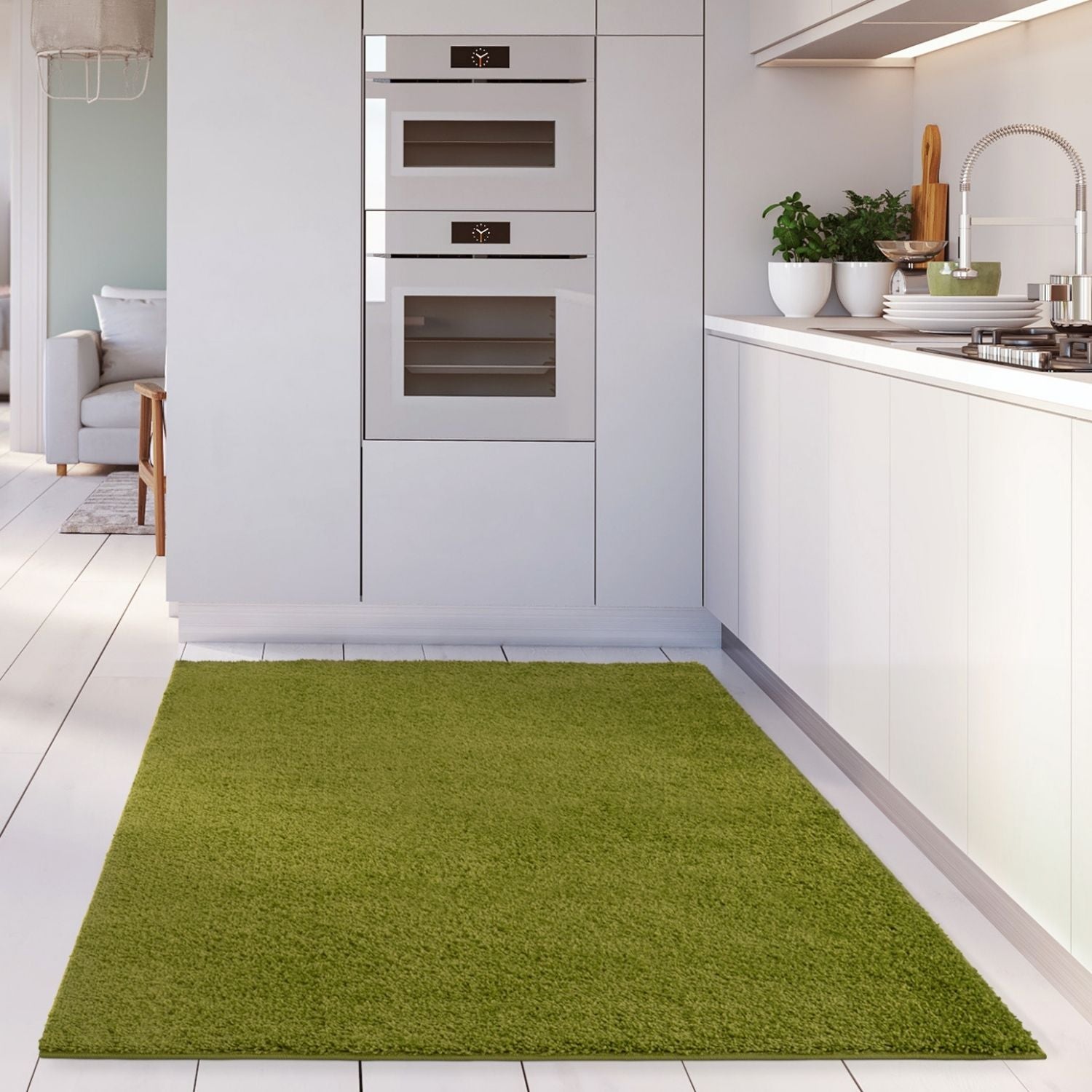 Myshaggy solid green rug with plush 30mm pile features a vibrant solid green color and soft shaggy texture on white tiles