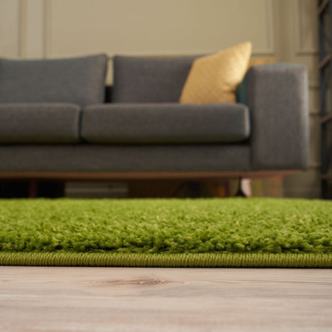Myshaggy solid green rug with vibrant color plush 30mm pile and shaggy textured surface with neatly bound edges