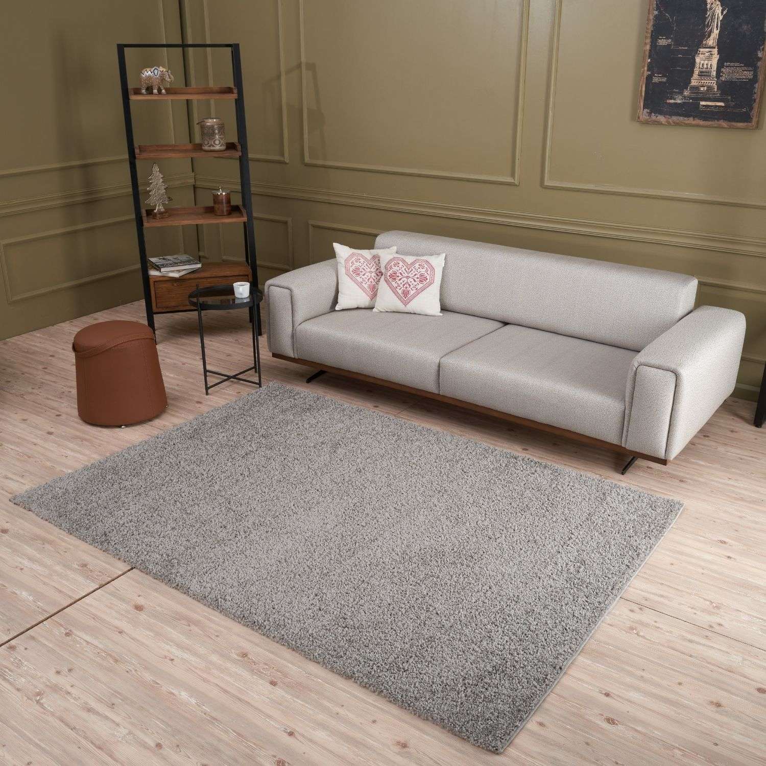A gray textured area rug made from soft material perfect for cozy spaces from myshaggy solid grey collection