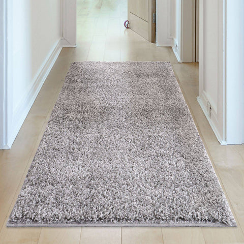 A plush shaggy gray runner rug with a soft textured surface and neat edges myshaggy solid grey design