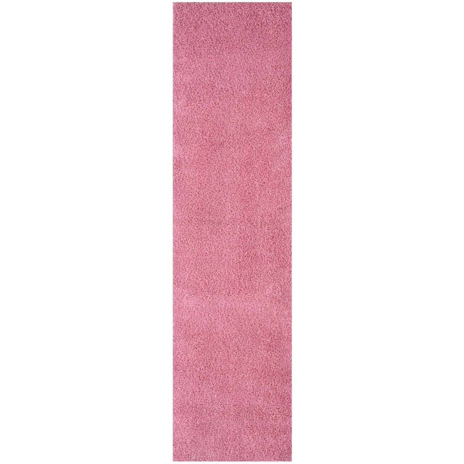 A plush myshaggy solid pink rug with soft shaggy texture perfect for cozying up any room