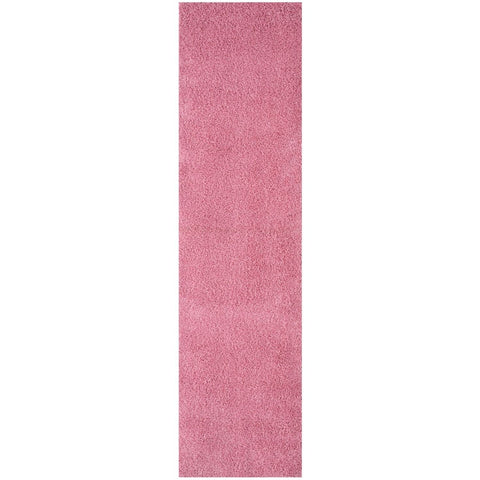 A plush myshaggy solid pink rug with soft shaggy texture perfect for cozying up any room