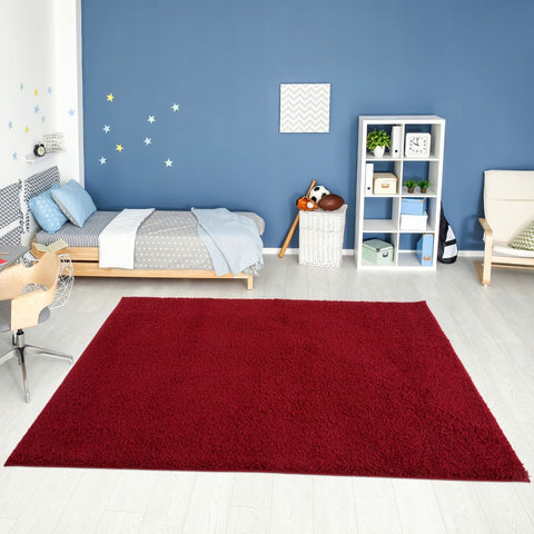 A plush myshaggy solid red rectangular rug with a soft shaggy texture perfect for cozy spaces