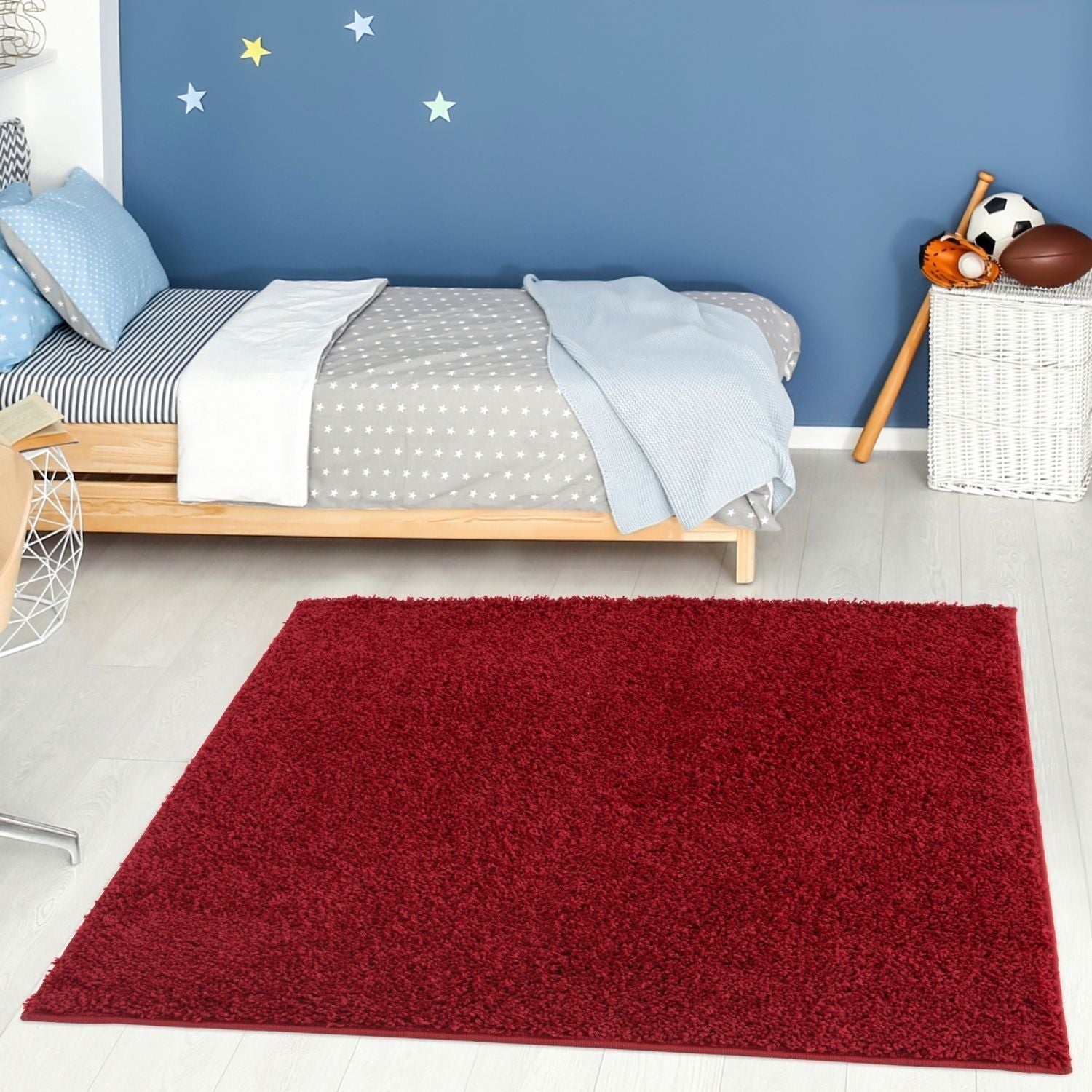 A plush myshaggy solid red rectangular rug with soft shaggy texture perfect for cozy living spaces