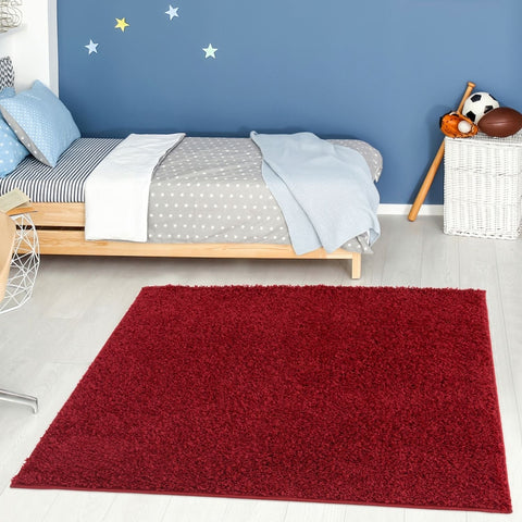 A plush myshaggy solid red rectangular rug with soft shaggy texture perfect for cozy living spaces