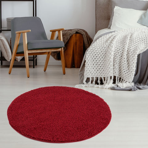 Myshaggy solid red circular shag rug with a plush soft texture perfect for cozy home decor