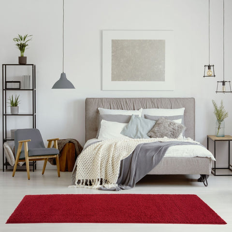 Vibrant red plush rectangular myshaggy solid red rug perfect for cozy indoor spaces and modern decor