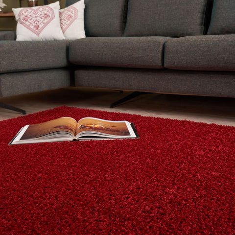 Vibrant red shaggy area rug with a plush textured surface myshaggy solid red perfect solid red rug option