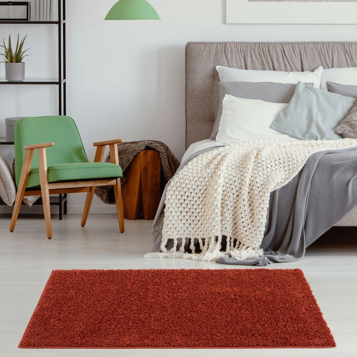A plush rectangular terracotta solid terra rug with a dense shaggy texture from myshaggy solid collection