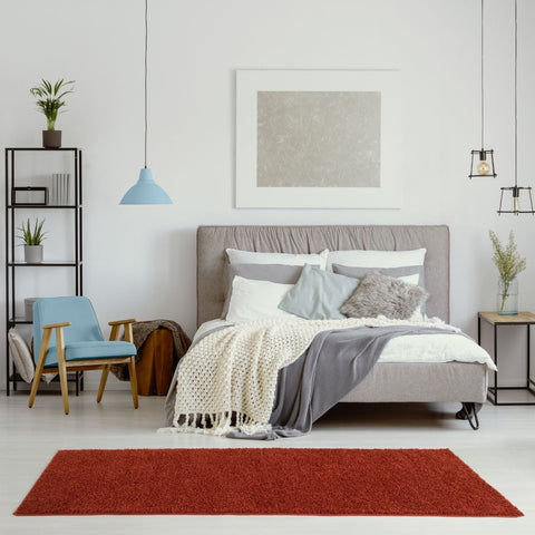 A plush vibrant red myshaggy solid terra rug with a soft textured surface perfect for cozy home spaces