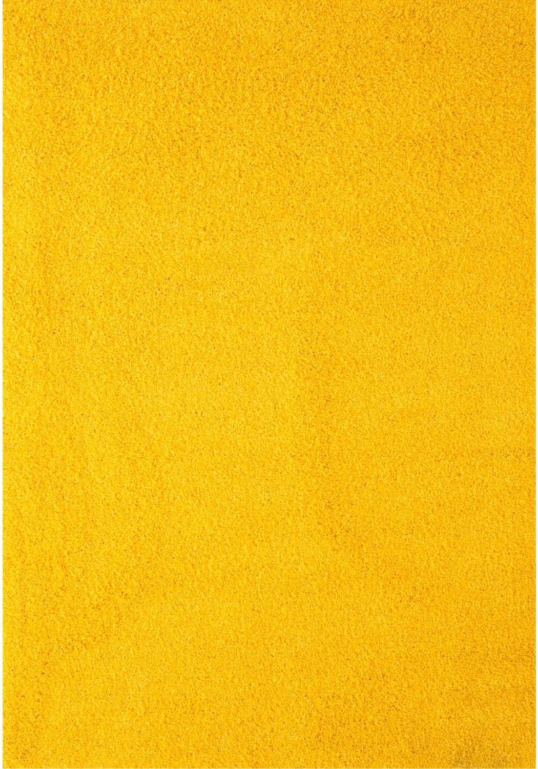 A plush myshaggy solid yellow rug with a soft textured surface perfect for cozy solid yellow rug vibes