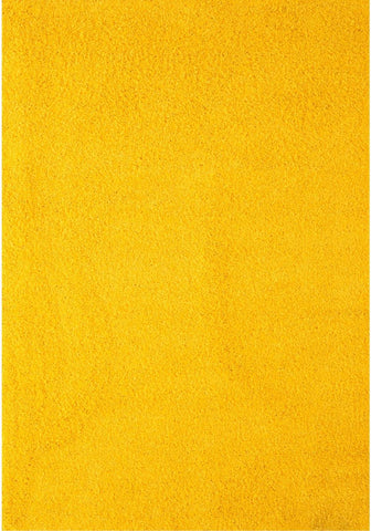 A plush myshaggy solid yellow rug with a soft textured surface perfect for cozy solid yellow rug vibes