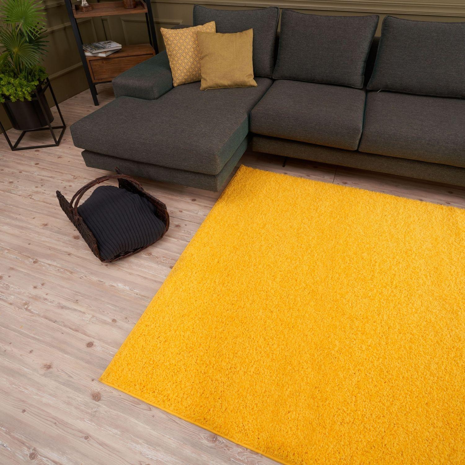 Vibrant yellow shaggy area rug myshaggy solid yellow features soft plush texture perfect for cozy living spaces