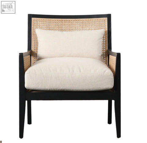 Black-framed nagoya rattan armchair with woven cane back and cream upholstered seat and pillow natural black