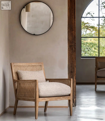 Nagoya rattan arm chair with light wood frame and woven cane back and sides in natural and black finish