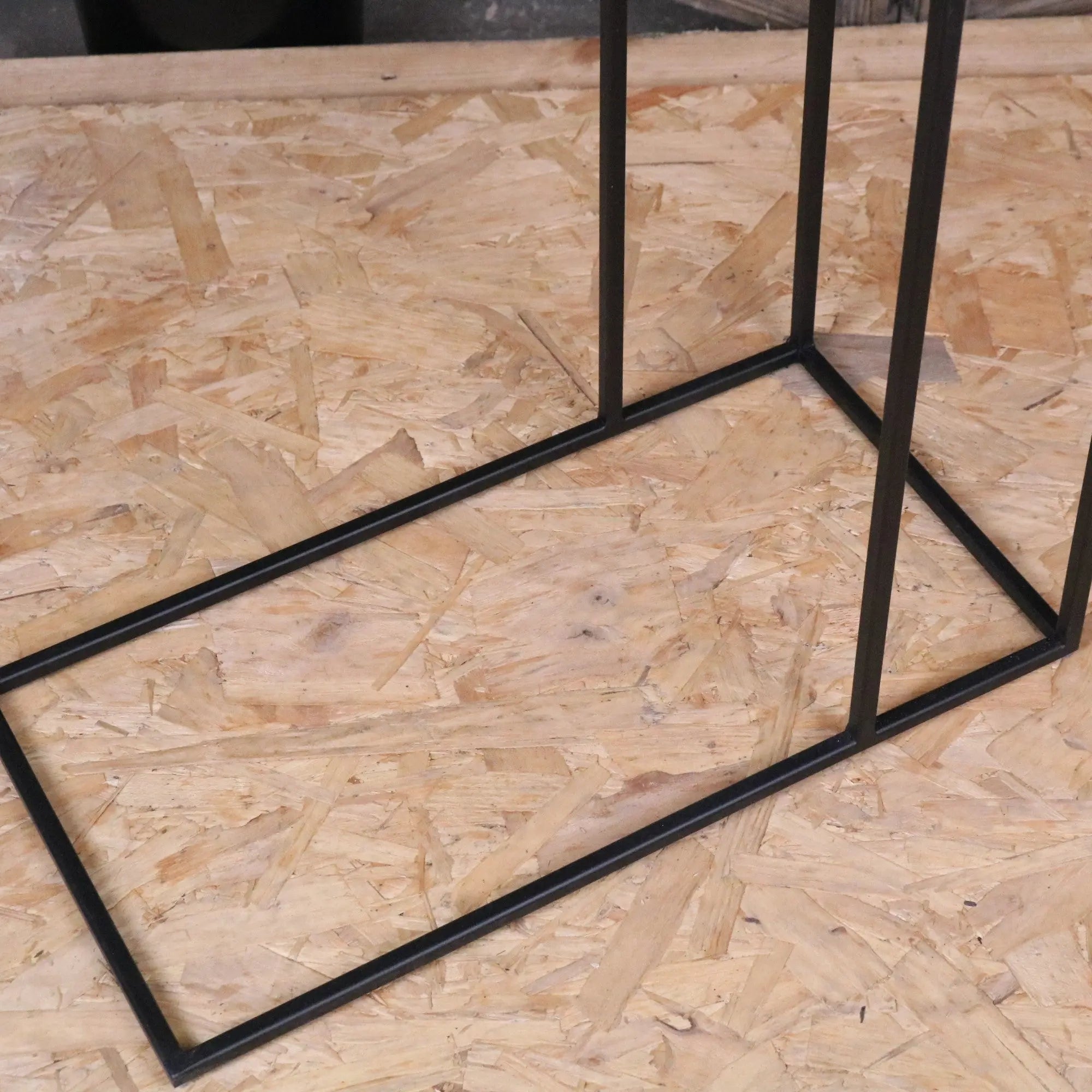 Black metal frame coffee table with minimalist rectangular design perfect as a gold sofa table or gold sofa accent