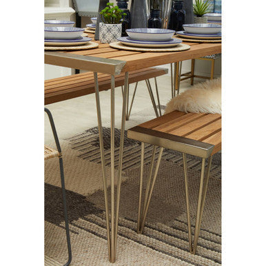 Modern nandri slatted teak wood dining table with natural wood top and slender metallic legs perfect for wood dining spaces