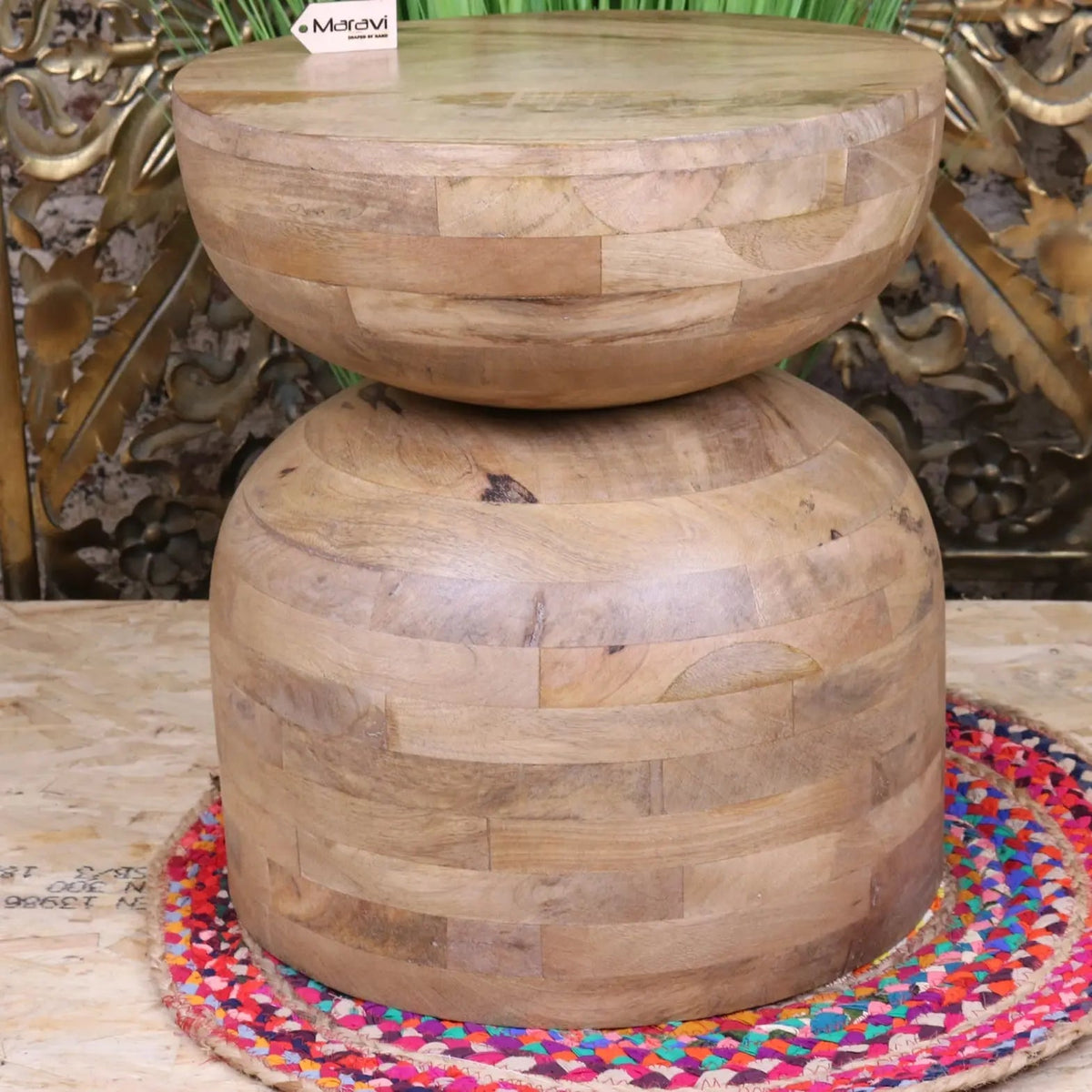 Handcrafted narmada swirl mango wood side table with stacked bowl design made from light-colored reclaimed mango wood planks