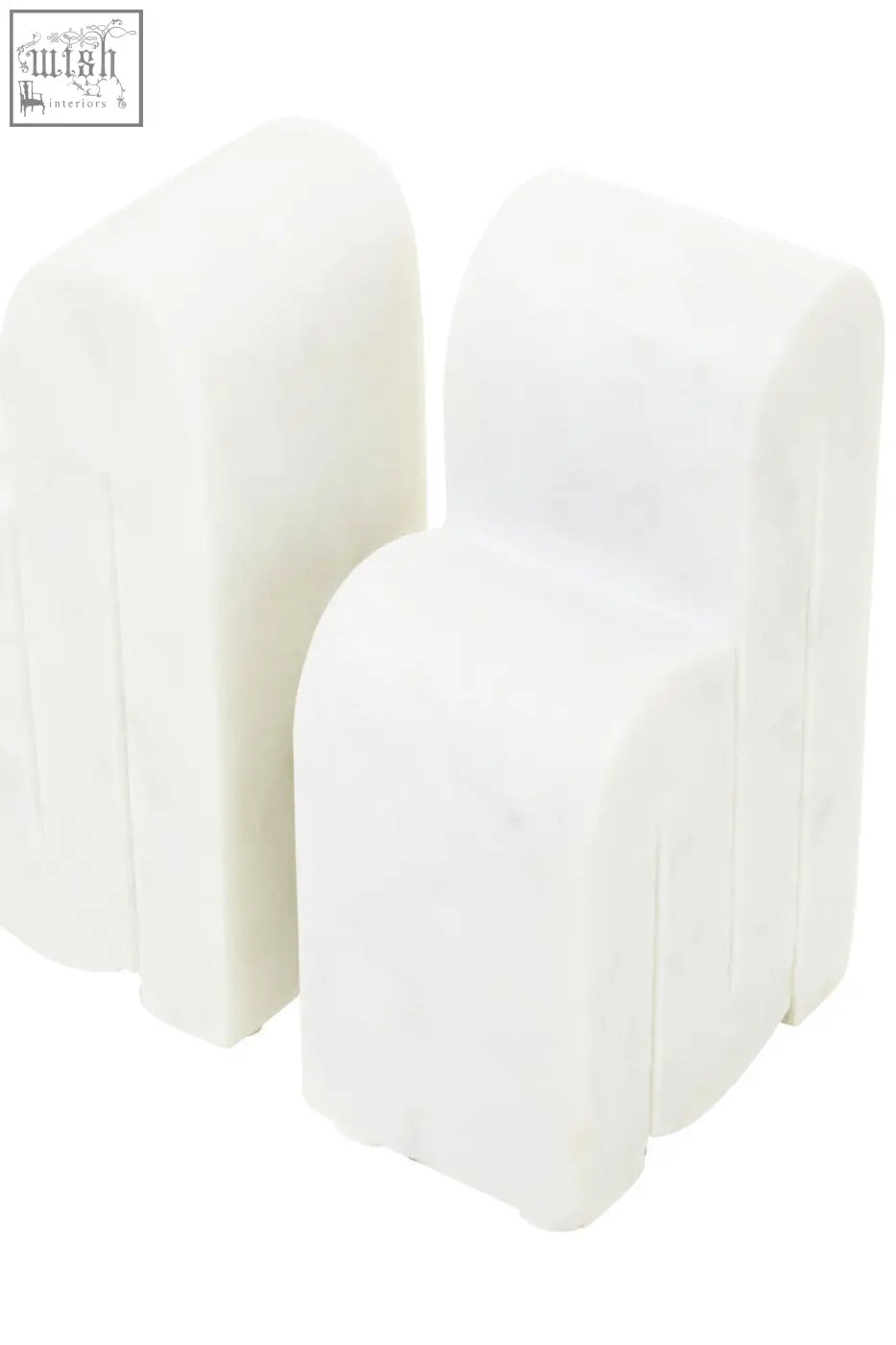White plastic chair-shaped protective corner guards included with nason set of 2 white marble bookends