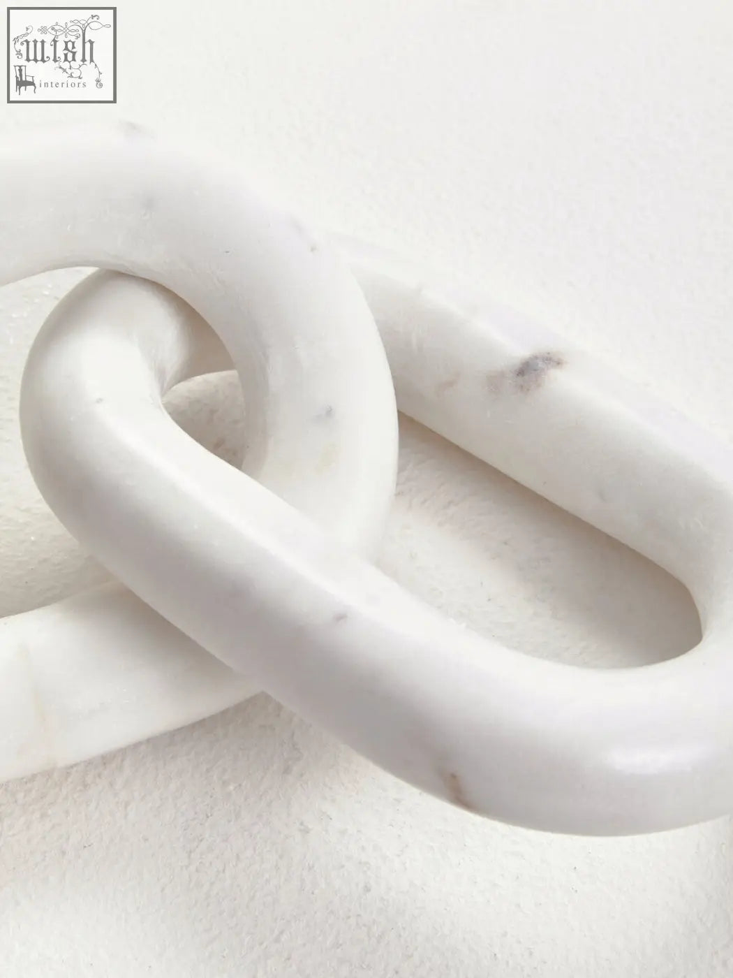 Nason white marble three link chain sculpture featuring a sleek white marble three link chain decor piece