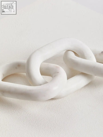 Nason white marble three link chain sculpture with smooth glossy finish and subtle veining in a link chain design