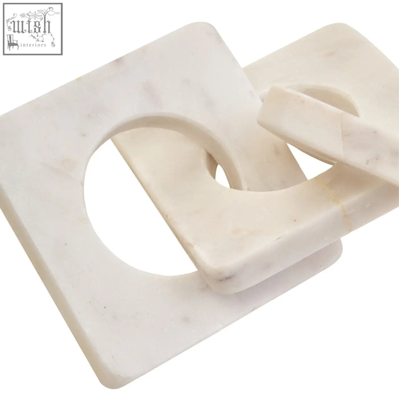 White marble square coasters with circular cutout design complementing the nason white marble three link chain