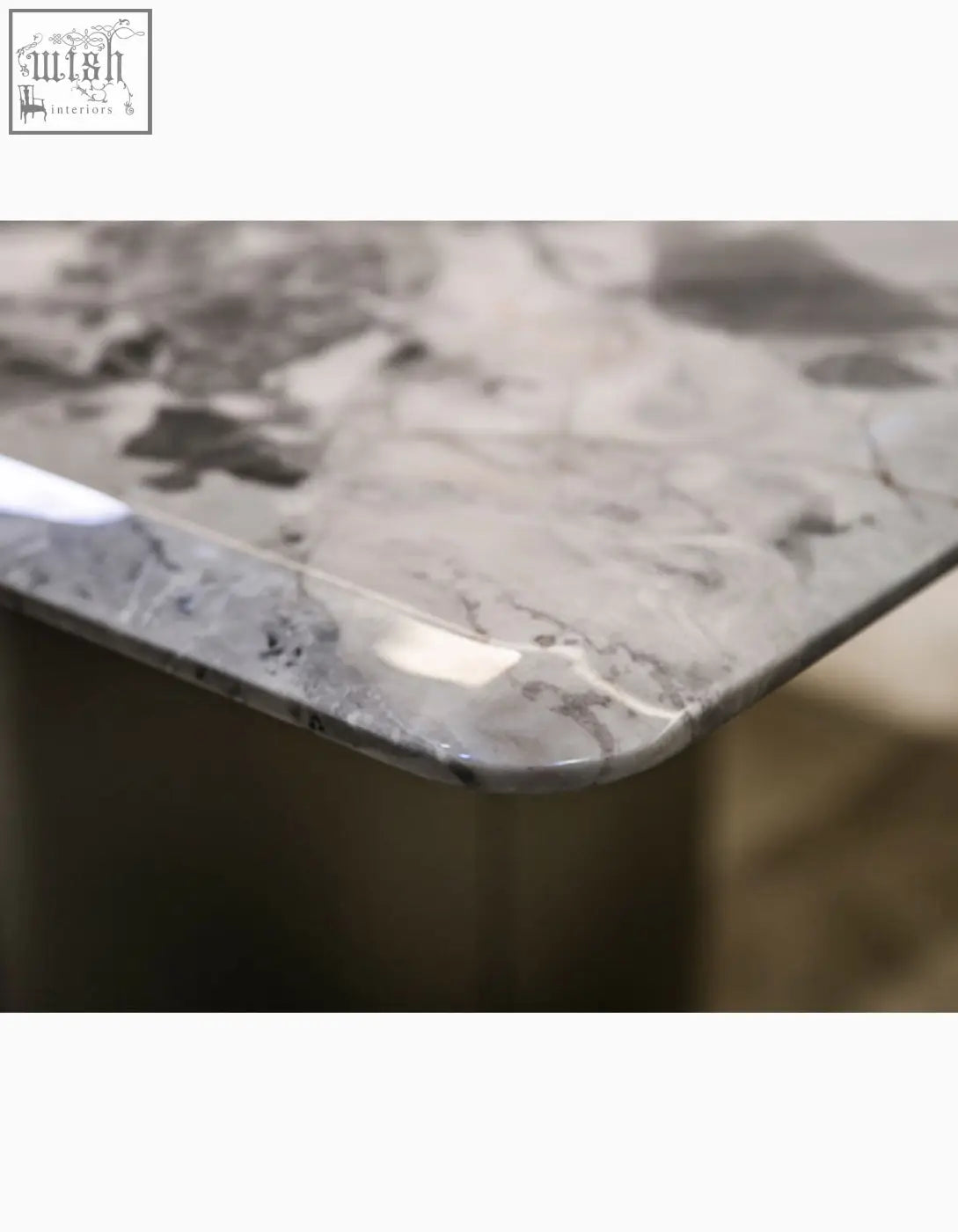 Natural marble dining table with gray marble tabletop and subtle veining adds elegance to any dining table setting