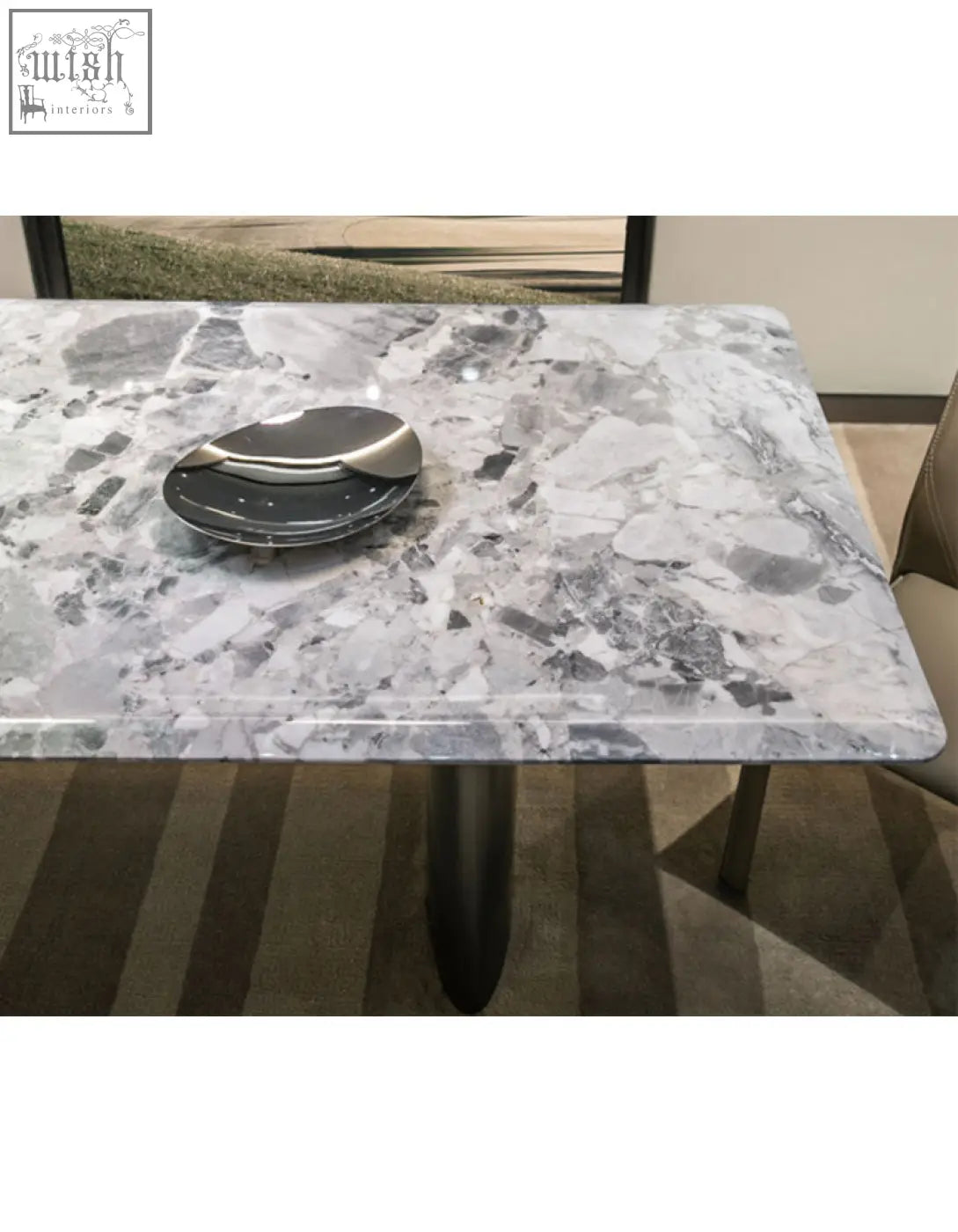 Natural marble dining table with gray and white marble top and sleek modern legs adds style to your dining area