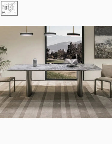 Natural marble dining table with sleek gray marble top and polished metallic legs adds modern style to any dining space