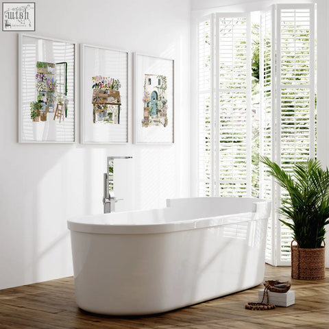 White freestanding bathtub with sleek modern design and glossy surface in nature canvas wall art flower shop set