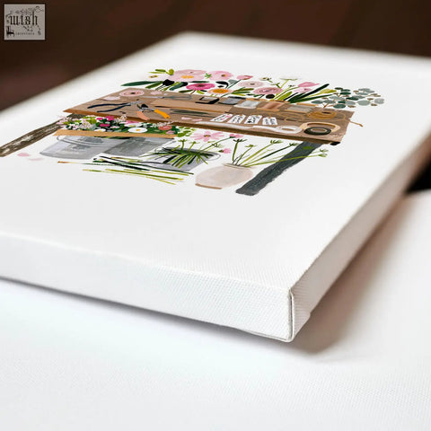 White canvas wall art with whimsical pink peach and green floral arrangement on wooden shelves for flower shop decor