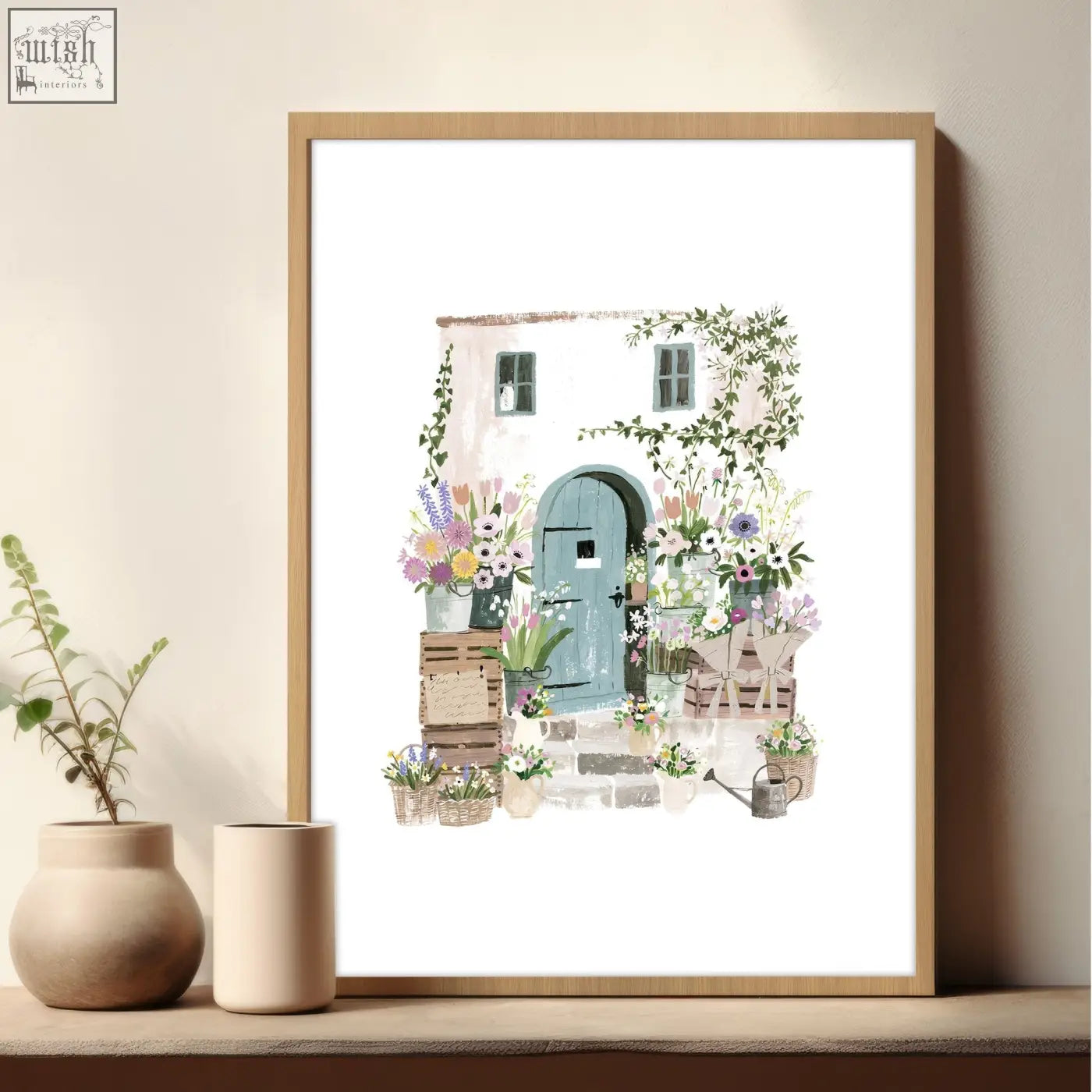 A framed nature canvas wall art featuring a watercolor cottage with ivy and flowers for flower shop decor