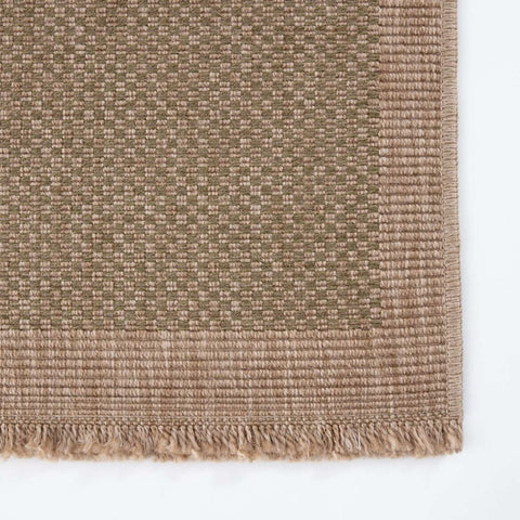 Beige woven nature outdoor rug green with textured interlaced pattern and fringed edges perfect for outdoor use