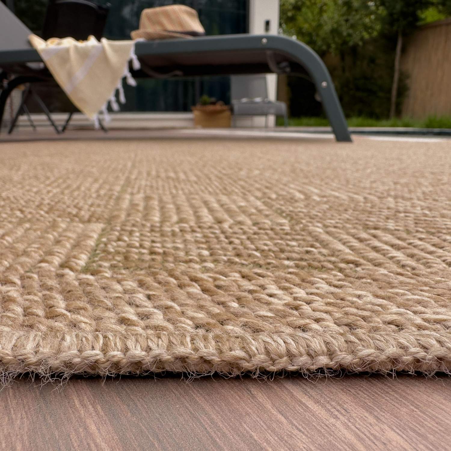 Nature outdoor rug green with textured beige brown natural fiber woven surface and braided edges perfect for outdoors