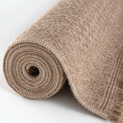 Beige textured jute nature outdoor rug neutral with woven pattern and fringed edges perfect for outdoor use