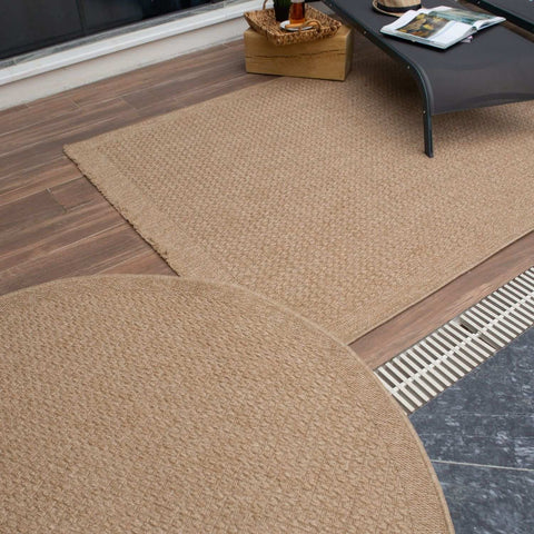 Beige woven jute nature outdoor rug neutral with textured interlaced pattern perfect for outdoor use
