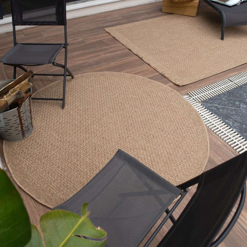 Round beige woven nature outdoor rug neutral perfect for outdoor spaces with natural textured design