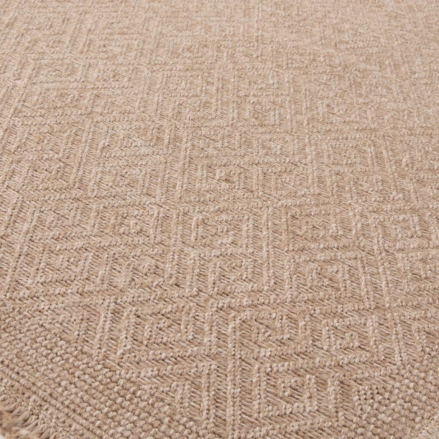 Beige woven nature outdoor rug with textured herringbone pattern perfect as an outdoor rug neutral choice