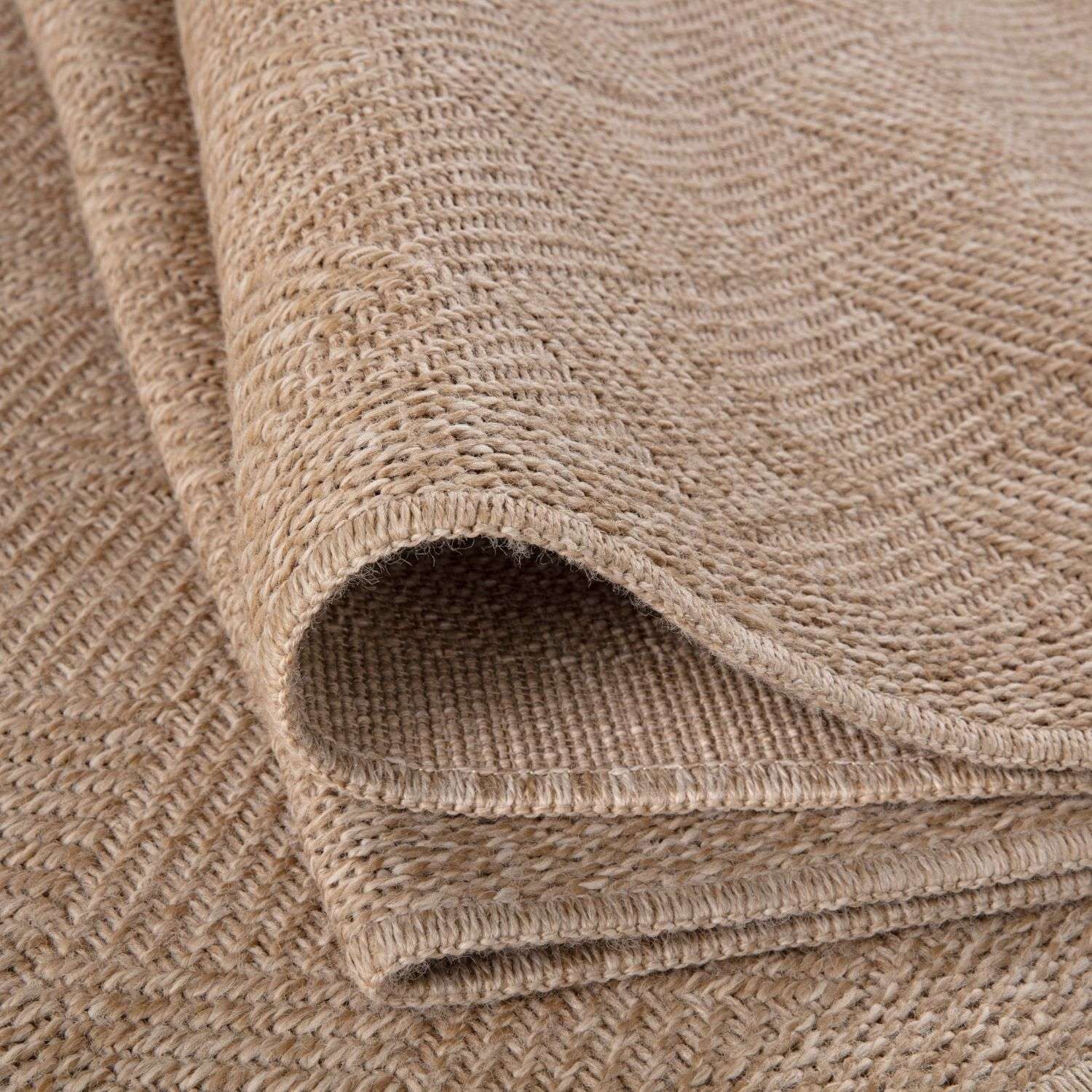 Beige woven nature outdoor rug neutral with textured herringbone pattern perfect for outdoor use