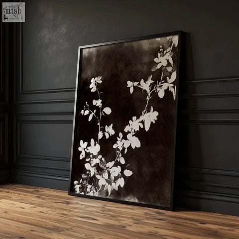 Black-framed nature painting art prints with white floral silhouettes on dark brown-black textured background set of 3