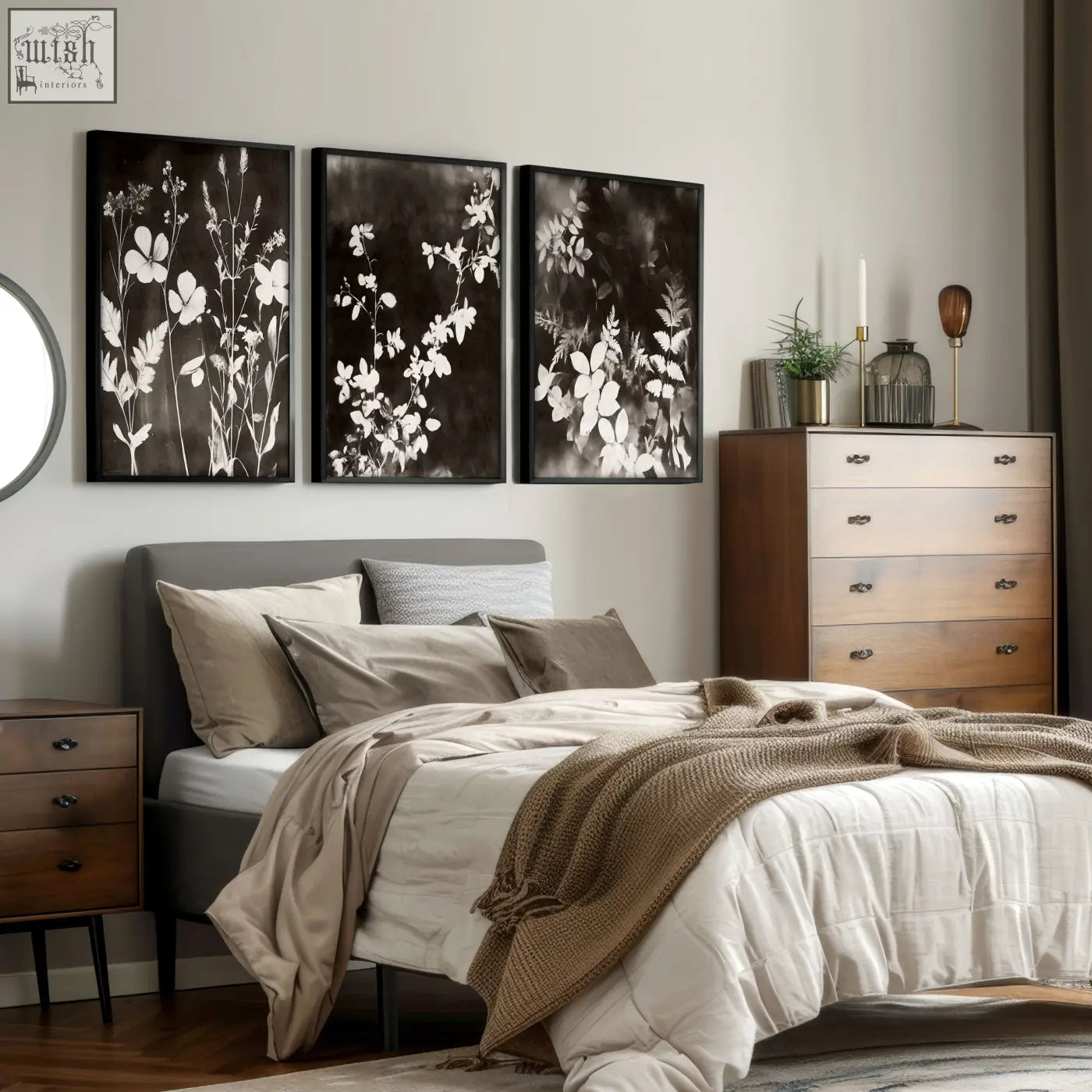 Three black and white botanical art prints with white floral silhouettes in sleek black frames for nature painting decor
