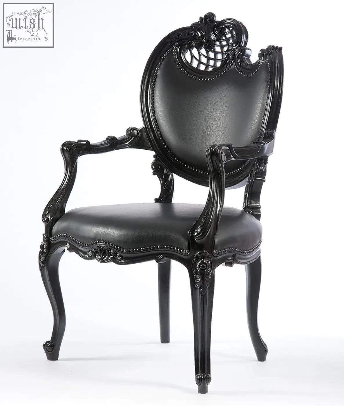 Neo rococo arm chair black leather with ornate carved wooden frame and decorative beaded trim for elegant seating