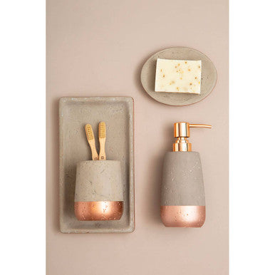 Gray concrete neptune bathroom tray toothbrush holder with rose gold accents and matching soap dish view