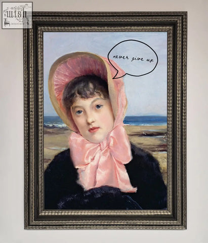 Never give up framed wall art featuring a young girl in a pink bonnet with an ocean backdrop in a framed wall