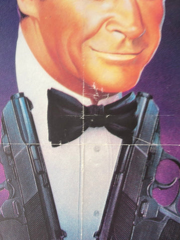 Black bow tie worn with white tuxedo shirt on original yugoslavian never say never again 1983 cinema poster