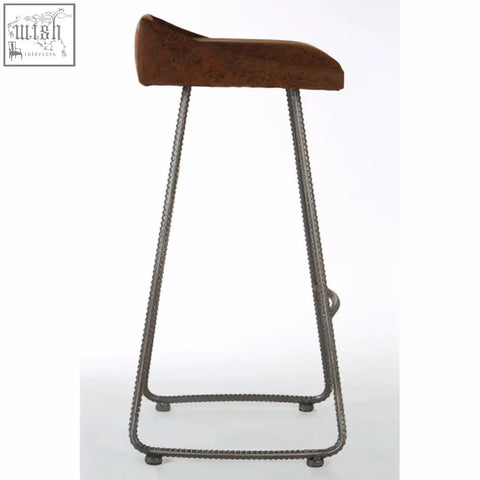 Brown leather effect bar stool with twisted rebar-like metal legs and brown upholstered seat from new foundry