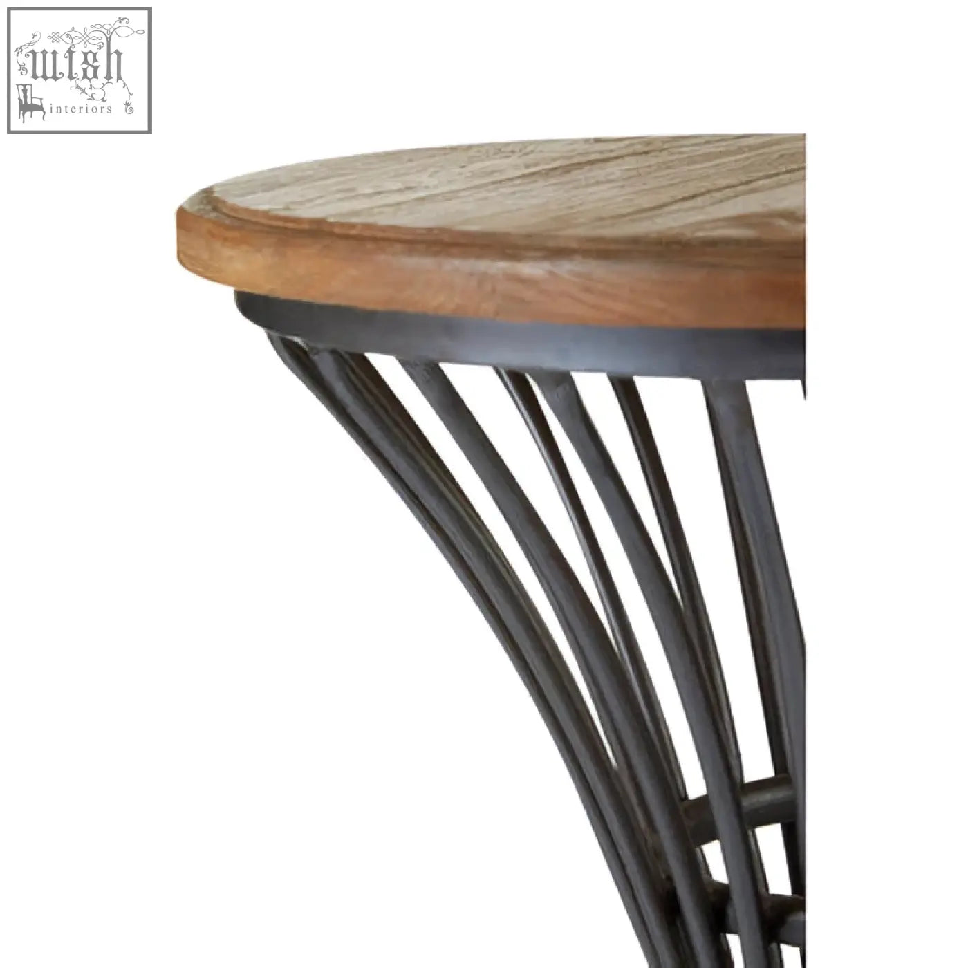 Round wooden tabletop with dark elm wood finish and slender black metal legs on new foundry metal bar stool