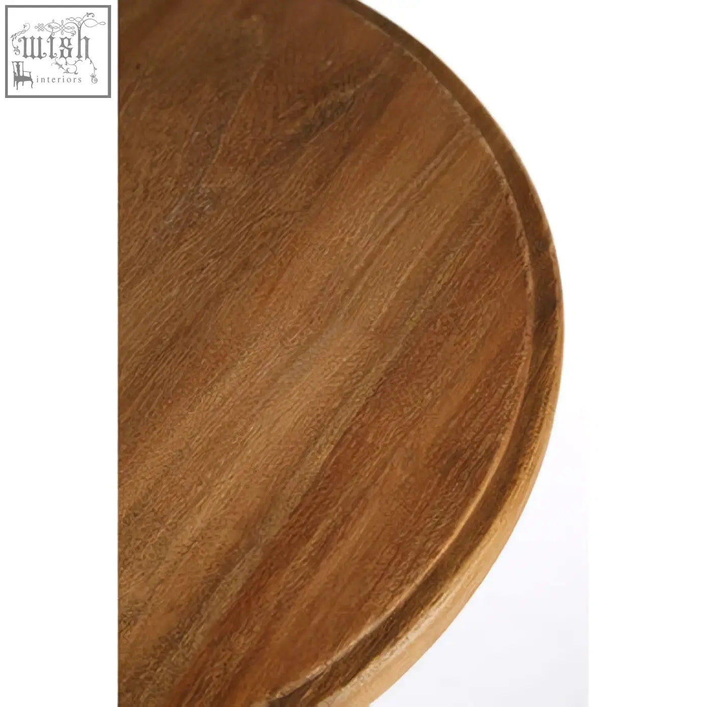 Round wooden cutting board with warm elm wood finish paired with a metal bar stool for stylish seating