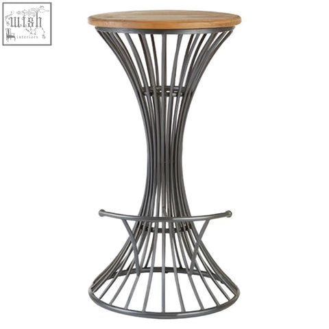 A sleek dark gray metal bar stool with a round elm wood top and elegant curved metal bar stool design